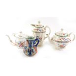 A Copeland Chinese rose pattern coffee pot, a teapot, a Royal Crown Derby posies teapot, and an octa