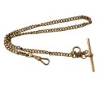 A 9ct gold curb link watch chain, with T bar and clip, 36cm long, 29.5g all in.