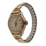 A 9ct gold cased wristwatch, with silver numeric dial, black hands, on expanding gold plated strap,