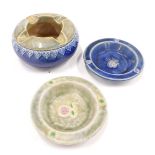 Three items of Royal Doulton wares, comprising a Royal Doulton blue and green glazed ash tray number