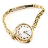 A 9ct gold cased wristwatch, with 2cm diameter Roman numeric dial and fancy gold plated bracelet, 22