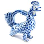 A late 19thC French faience hen water jug, moulded as a cockerel, blue polychrome decorated and sign