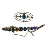 A semi precious stone set bracelet, set with multi coloured oval and rectangular faceted stones, on