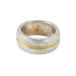A silver hammered design dress ring, with central gold band, ring size Q, 13.6g all in.
