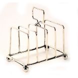 An Edward VII silver four branch toast rack, Birmingham 1906, 2.16oz.