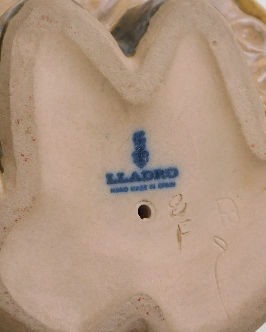 A Lladro matt glazed figure of a young girl titled Lonely, with blue stamp to underside, 22cm high. - Image 2 of 2