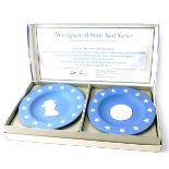 A cased set of Wedgwood state series pin dishes, in the blue jasperware, 11cm diameter, boxed.