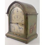 An early 20thC green Japanned mantel clock, the arched dial signed Butcher and Swan Nottingham, deco