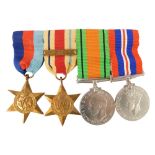 A group of World War II medals, comprising the George VI Defence medal, George VI medal, Africa Star