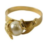 A modern dress ring, set with cultured pearl, with twist and vine decoration, plated.