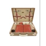 A Brexton picnic set, in red and pink, with fitted case.