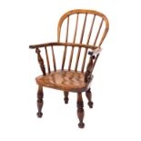 A 19thC ash and elm child's Windsor chair, 42cm wide.