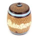 A Royal Doulton Slaters Patent tobacco jar, decorated with flowers and leaves within tube lining, im