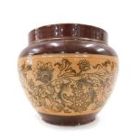 A Doulton Lambeth stoneware bowl, on a light and dark brown body and transfer printed art nouveau st