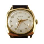 A Helvita 9ct gold cased gentleman's wristwatch, the silvered numeric dial with banded outer border,