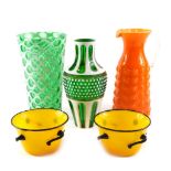 A group of decorative art glass, comprising two flash green vases, 24cm and 25cm high, an orange