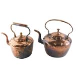 Two Victorian copper and brass kettles.