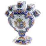 A 19th Porquier Beau Pique Fleur faience vase, in the Roqen deco, with central armorial and blue Por