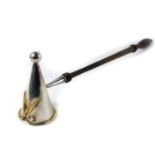 A Queen Elizabeth II silver candle snuffer by Sarah Jones, the tapering top with silver gilt decorat