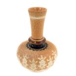 A Doulton Lambeth stoneware vase, with a fluted stem on bulbous body, with applied and moulded flowe