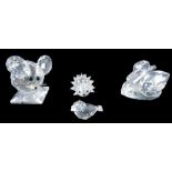 Crystal wares, comprising a Swarovski crystal swan and hedgehog, mouse and bird, with four unmatched
