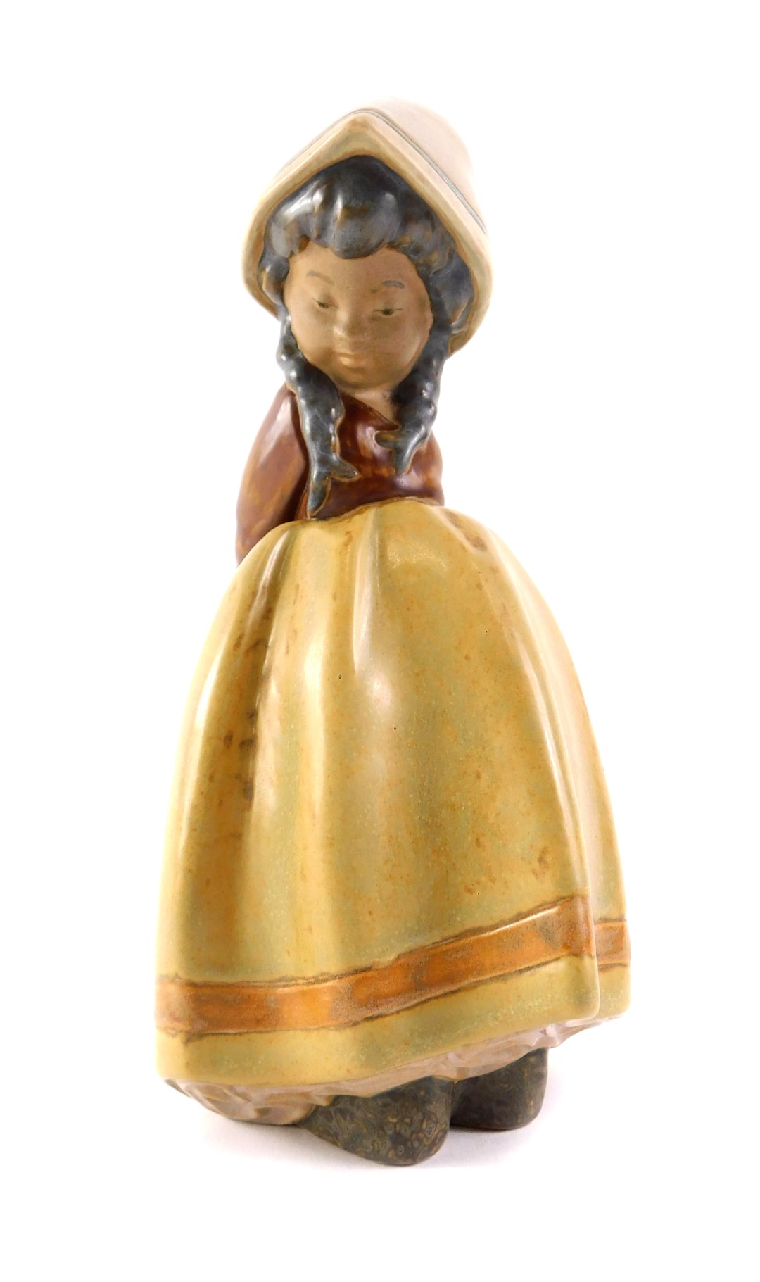 A Lladro matt glazed figure of a young girl titled Lonely, with blue stamp to underside, 22cm high.