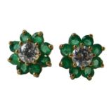 A pair of 9ct gold cluster stud earrings, each set with white and green paste stones, 2.6g all in.