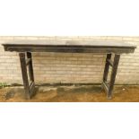 A Chinese ebonised altar table, with moulded frieze and plain end supports, 103cm high, 120cm wide,