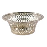 A George V silver sweet meat basket, of plain pierced decoration, Chester 1923, 1.40oz.