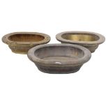 Three various Chinese wash bowls, each with brass coopered bands, the largest 50cm wide. (AF)