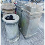 A pair of square tapering stoneware chimney pots, 74cm high, and two others. (4, AF)