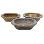 Three graduated Chinese wash bowls, each with coopered bands, and metal liners, associated and ill-f