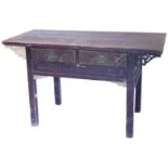 A Chinese altar table, the rectangular top on elaborately carved frieze, with two drawers and brass