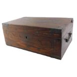 An Indian hardwood and brass inlaid writing box, with fitted interior, with side handles, 42cm wide.