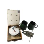 Two green enamel jugs, anchor, and a set of Salter suspended weighing scales, model 235.