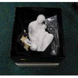A Royal Doulton Moments Special Bond figure, and a Border Fine Arts black faced lamb and boots. (2)