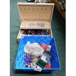 A grey leatherette jewellery box and contents, of crystallised necklaces, earrings, beaded necklaces