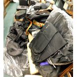A large quantity of guitar and other musical instrument bags, holdall, violin case, flute case with