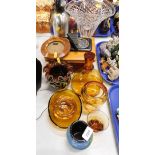 Whitefriars and other amber glass, to include a comprising decanter, a flared rim bowl, siphon, Elli