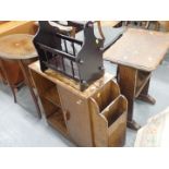 A group of assorted furniture, comprising four side tables, magazine rack, and a bookcase. (6)