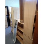 Various beech effect finished bookcases, cabinets, CD racks, white frame painted mirror, cane storag