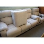 A manual recliner three seater sofa, an electric recliner matching armchair, and footstool, in grey