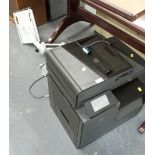 A HP colourjet printer and a table mounted computer stand.