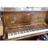 A walnut cased upright piano by Kirkman of London.