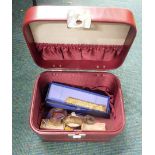 A maroon leatherette jewellery box and contents, comprising two silver bangles, silver Eastern inspi