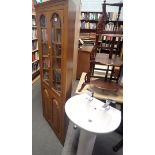 A pine corner cabinet and a white finish bathroom pedestal sink with two taps. (2)