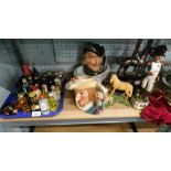 A small group of alcohol miniatures, two Royal Doulton character jugs, and a Simpson Shire horse fig