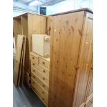 Assorted pine bedroom furniture, comprising a two door wardrobe, chest, bedsides, and a triple wardr