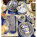 Blue and white wares, comprising cups and saucers, mugs, pepper pots, glass vases, Goebel figure, et