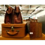 A brown leather case and four others. (5)